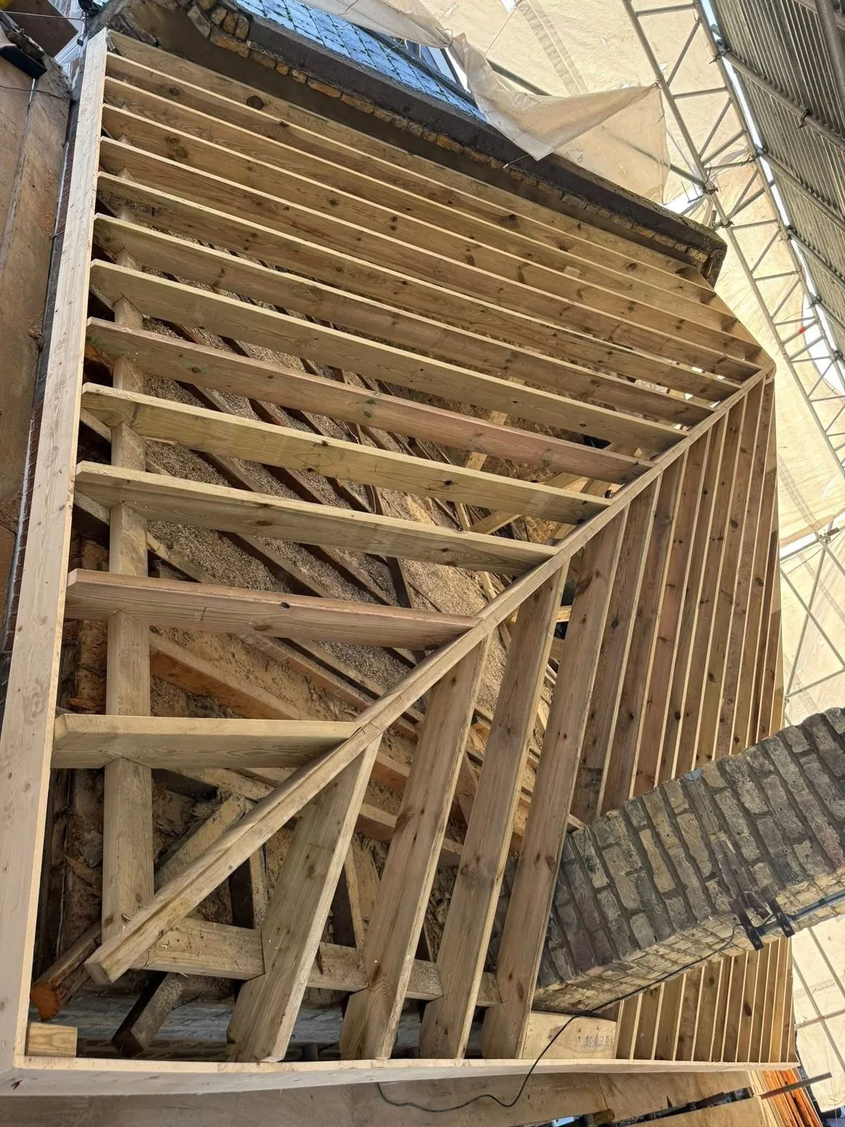New roof timbers and rafters during a re-roof in Dawlish